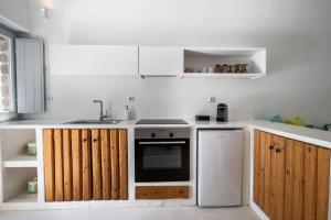 Kjøkken eller kjøkkenkrok på Fertimo Suites