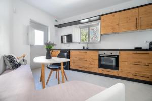 Kjøkken eller kjøkkenkrok på Fertimo Suites