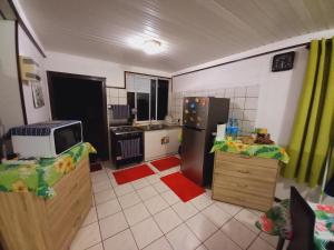 A kitchen or kitchenette at BORA BORA VAITIHEI LODGE