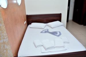 Postel nebo postele na pokoji v ubytování Hotel Paris