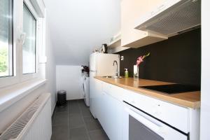 Кухня или кухненски бокс в WHITE ROOMS ARENA ZAGREB