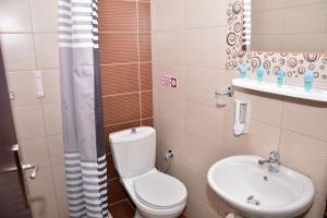Koupelna v ubytování Hotel Paris