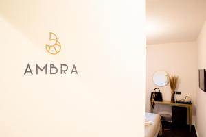 Televízia a/alebo spoločenská miestnosť v ubytovaní Bellevue - Rooms & Suites