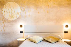 Posteľ alebo postele v izbe v ubytovaní Bellevue - Rooms & Suites