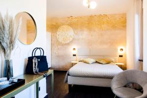 Posteľ alebo postele v izbe v ubytovaní Bellevue - Rooms & Suites