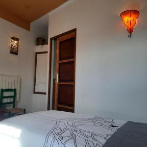 Postel nebo postele na pokoji v ubytování Alpujarra Guesthouse, remote off-grid mountain accommodation