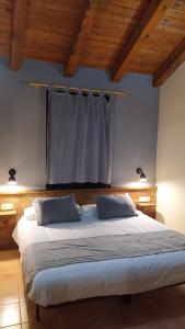 Postel nebo postele na pokoji v ubytování Apartaments Beta