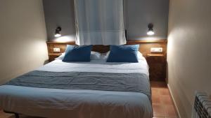 Postel nebo postele na pokoji v ubytování Apartaments Beta