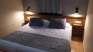Postel nebo postele na pokoji v ubytování Apartaments Beta