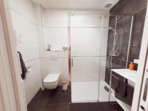 Ванна кімната в Maison Holen
