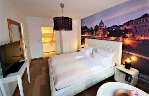 Giường trong phòng chung tại Studio Rome in der Altstadt