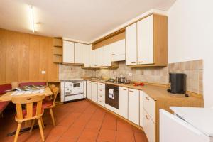 Kuchyň nebo kuchyňský kout v ubytování Appartement Sonneck