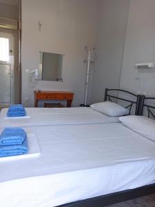 A bed or beds in a room at Vias