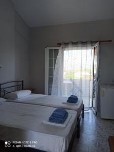 A bed or beds in a room at Vias