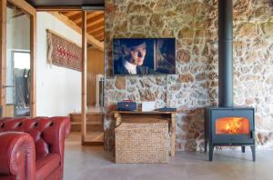 TV a/nebo společenská místnost v ubytování Pulieru - Picos de Europa views, designed for all seasons