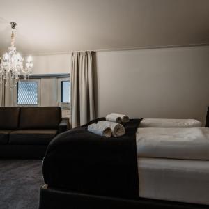 Łóżko lub łóżka w pokoju w obiekcie The Place Boutique & Design Hotel Flachau