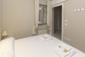 Postel nebo postele na pokoji v ubytování Agriturismo Cascina Carai