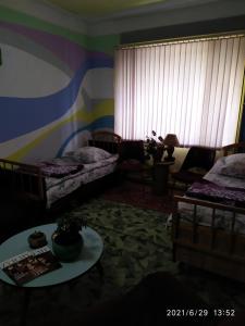 Postel nebo postele na pokoji v ubytování Guest House Dompolski