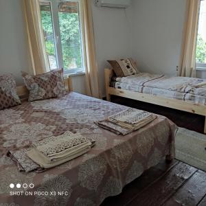 Postel nebo postele na pokoji v ubytování Mercury Guest House