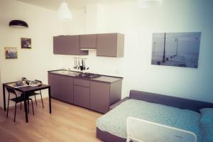 Kuchyňa alebo kuchynka v ubytovaní Residence Neverin Trieste