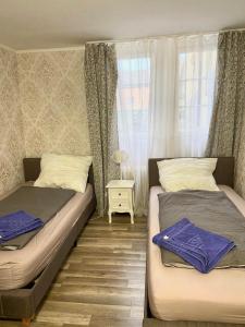 Ein Bett oder Betten in einem Zimmer der Unterkunft The Burgklause Boutique Hotel