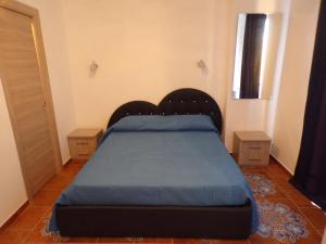 Postel nebo postele na pokoji v ubytování NUOVA AURORA Rent Rooms
