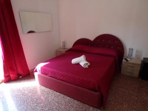 Postel nebo postele na pokoji v ubytování NUOVA AURORA Rent Rooms