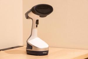 a black and white microphone sitting on top of a table at karaksa hotel TOKYO STATION in Tokyo