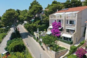 an aerial view of a building with purple flowers at VILLA Bose in Brela