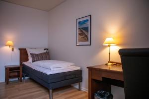 Hotel Phønix Hjørring 객실 침대