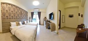 TV a/nebo společenská místnost v ubytování Ruisui Style B&B