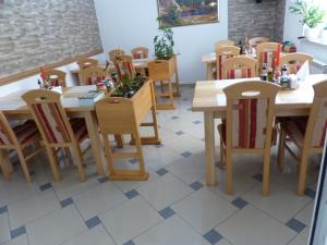 Reštaurácia alebo iné gastronomické zariadenie v ubytovaní House Pox