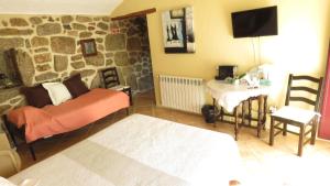 Cama ou camas em um quarto em Quinta da Ribeira
