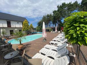 Imagen de la galería de Oaza Resort, en Stegna 40 fotos más