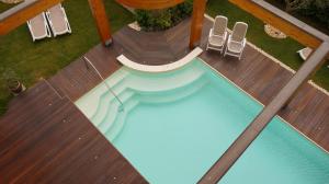 The swimming pool at or close to Residence Rivachiara (check-in at Hotel Riviera in Viale Rovereto, 95)