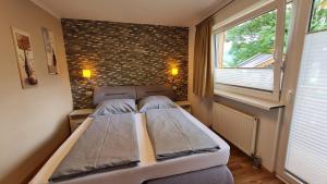 Posteľ alebo postele v izbe v ubytovaní Ferienwohnung Sevim