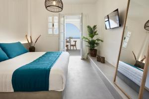 Postel nebo postele na pokoji v ubytování Symmetry Suites + 37 fotografií