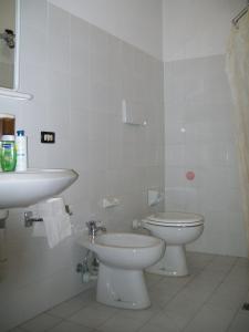 Ett badrum på Locanda La Rotonda