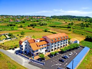 an aerial view of a building with a parking lot at Hotel Campomar 3*** Superior in A Lanzada