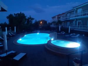Bazén v ubytovaní Armonia Hotel by Zante Plaza alebo v jeho blízkosti