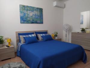 Ein Bett oder Betten in einem Zimmer der Unterkunft La Casa al Colle