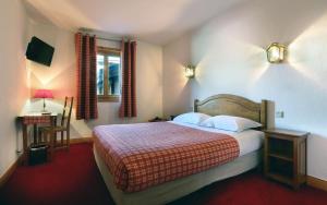 Postel nebo postele na pokoji v ubytování Hotel Autantic