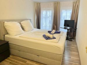Ein Bett oder Betten in einem Zimmer der Unterkunft The Burgklause Boutique Hotel