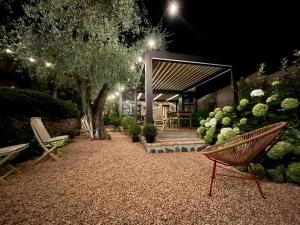 A garden outside Borgata Cantone Country House B&B