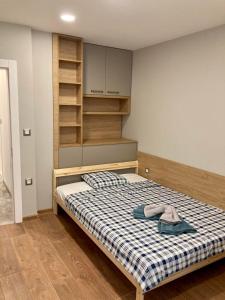 Ένα ή περισσότερα κρεβάτια σε δωμάτιο στο Magnolia apartment