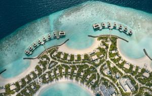 an aerial view of a resort on the beach at Patina Maldives, Fari Islands in North Male Atoll