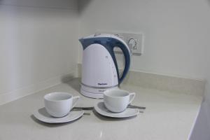 Príslušenstvo na prípravu kávy alebo čaju v ubytovaní Apartaments Centre Figueres