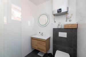 Koupelna v ubytování Two Flowers Luxury Apartment