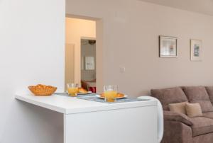 Posezení v ubytování Two Flowers Luxury Apartment