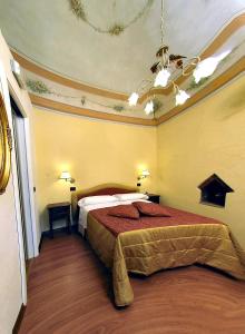 Posteľ alebo postele v izbe v ubytovaní Hotel Di Stefano